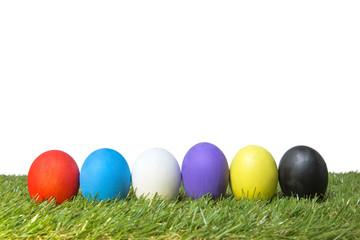Fototapeta na wymiar Colorful handmade easter eggs on green grass