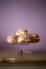 donuts lying on a decorative plate