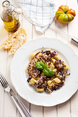 gnocchi with smoked ham and blue cabbage