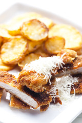 fried Parmesan pork fillet with Parmesan potatoes