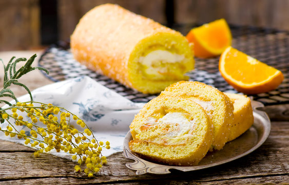swiss roll with whipped cream and orange cream