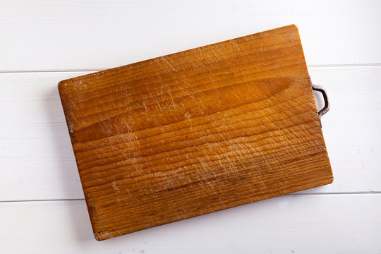 Cutting Board On White Wood Background