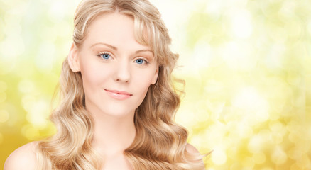 Fototapeta premium beautiful young woman face with long wavy hair