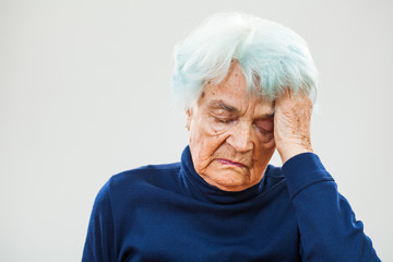 Senior woman having headache