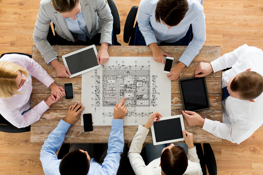 Business Team Or Architects With Blueprint