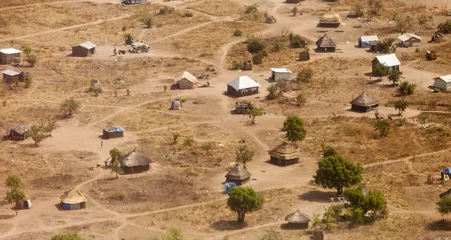 Fotobehang aerial view of African village © Wollwerth Imagery
