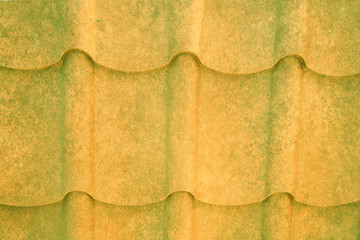 grained yellow and green metal roof