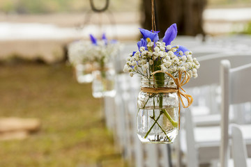 flowers hanging in mason jar