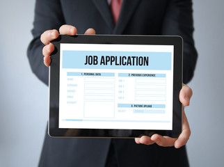 businessman with job application  on a tablet