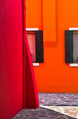 Orange and red plaster exterior walls in Italy