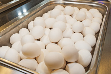 Closeup of fresh eggs in a tray