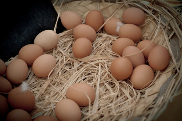 Basket of organic eggs in a rural farmers market