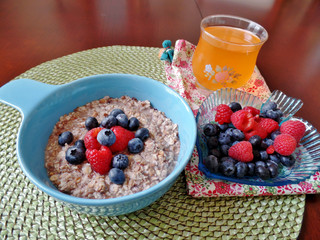 A bowl of oatmeal topped with fresh fruit