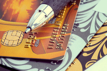 Close up a credit card and pen