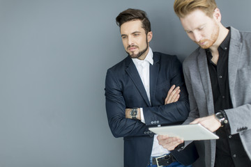 Young men with tablet