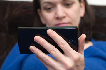 woman hands holding  smartphone