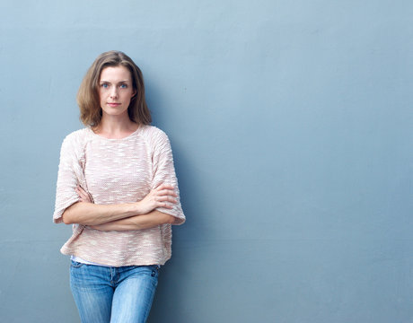 Confident Mid Adult Woman Posing With Arms Crossed