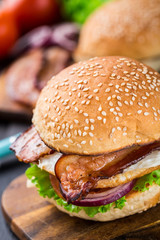Home made burger on wooden board