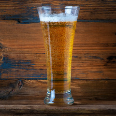 Beer glass on a wooden table
