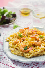 Pasta with shrimps and tomato sauce