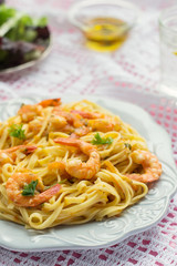 Pasta with shrimps and tomato sauce