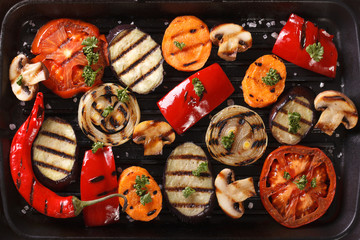 Background of grilled vegetables close up. Horizontal top view