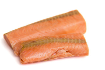 Raw salmon fillet isolated on white