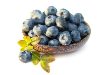 Fresh sweet tasty blueberries on white background