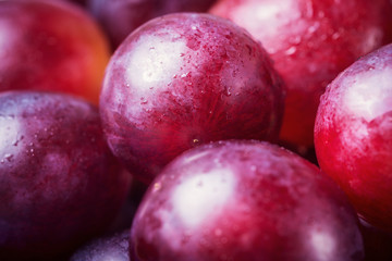 Macro of fresh red grapes with water drops