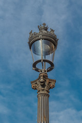 Old-fashioned street lamp against the sky. Barcelona, Spain