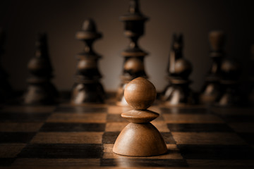Chess. White pawn against all black.