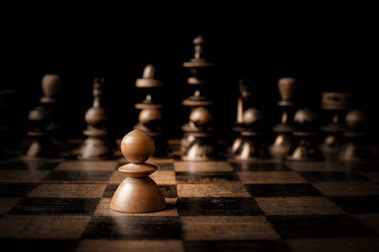 Chess. White pawn against all black.