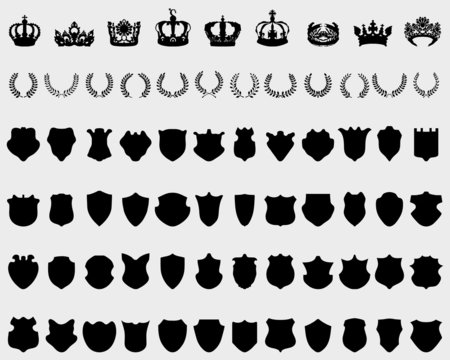 Silhouettes of crowns, shields and laurel wreaths