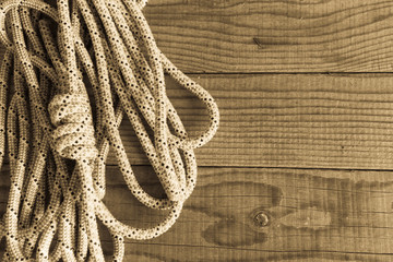 Mountain rope on wooden background