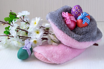 Easter eggs, boots and apple flowers