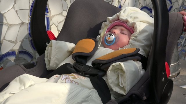 Little Sleeping Newborn Baby Swing in Safety Car Seat. 4k Ultra 