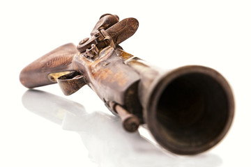 Antique flintlock blunderbuss pistol detail, on white