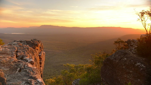 Sunset view from the mountain top Balconies lookout in the Grampians National Park, Victoria, Australia over the Victoria Valley and mountain ranges.