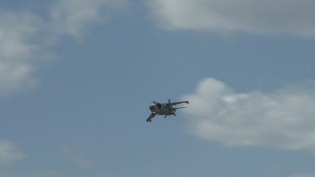 Hawker Harrier Jump Jet makes a fast fly past.