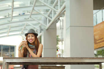 Woman with a coffee cup