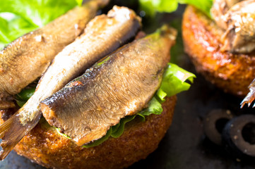 Burger with sardines