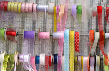 Decorative ribbons displayed on rails