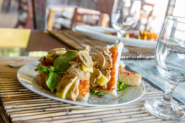 tapas appetizer plated in small outdoor restaurant