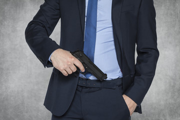 businessman with a gun