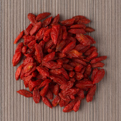 Circle of dry red goji berries