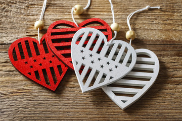 Hearts on wooden background