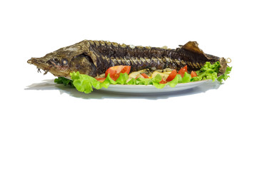 Hot smoked sturgeon on the dish