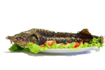 Hot smoked sturgeon on the dish