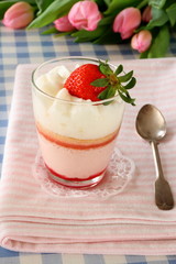 Dessert strawberry cream in glass with tulip