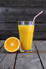 Orange juice and half an orange